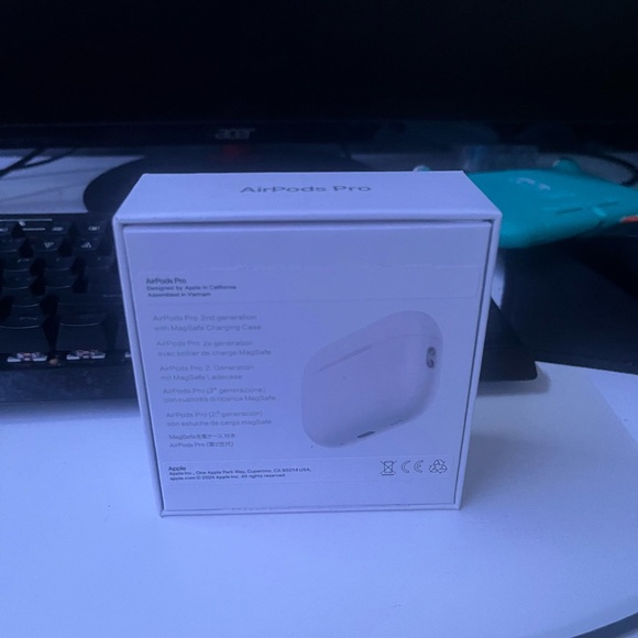 Apple AirPods Pro 2nd Generation with Charging Case in White - Picture 2 of 5